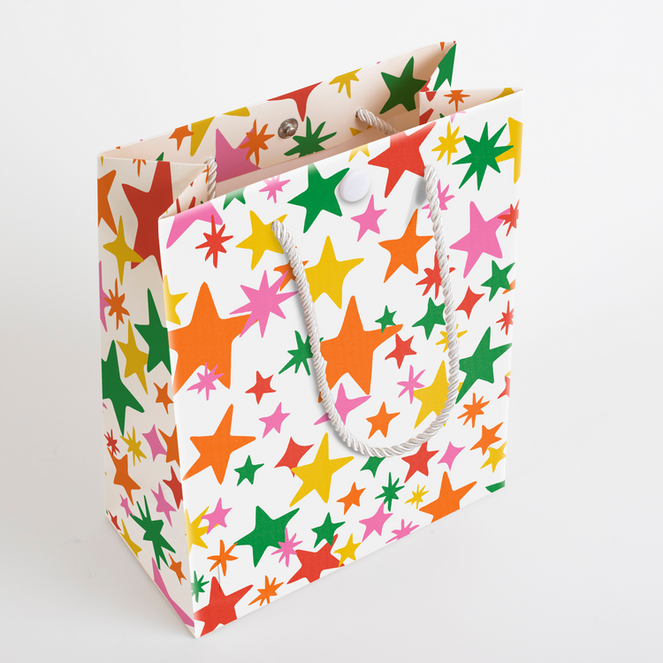 Opened endless mariachi musical prank gift bag displaying interior space and Joker Greeting tab removal activation system