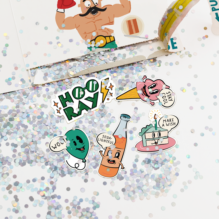 Birthday boxer prank card with multicolor glitter and cartoon character stickers scattered around Happy Birthday greeting card