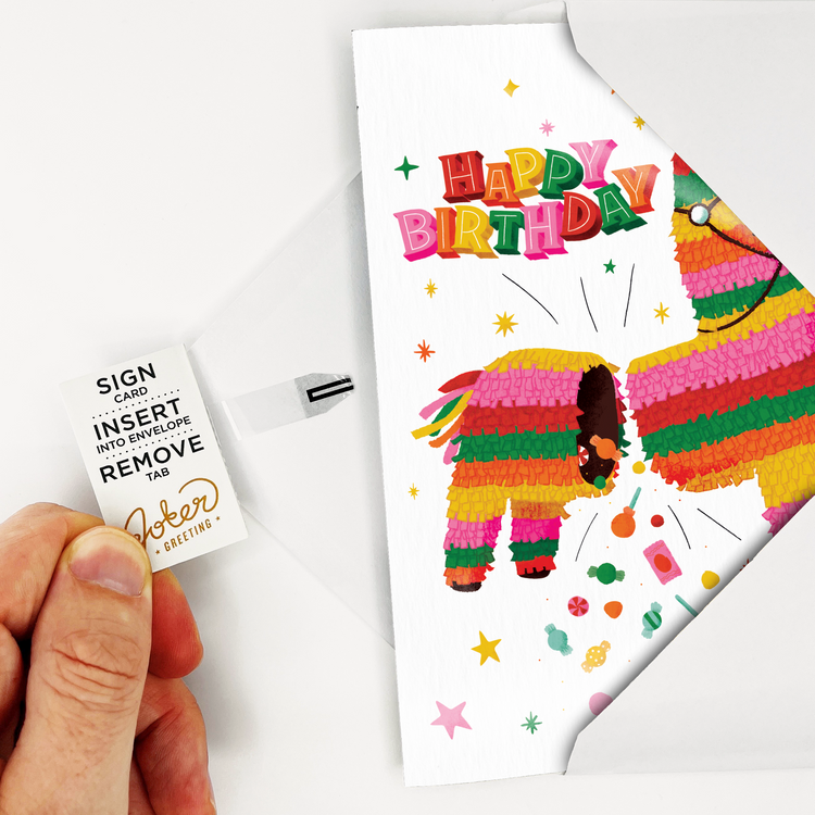 Piñata Card inside the white envelope; removed tab which arms the card.