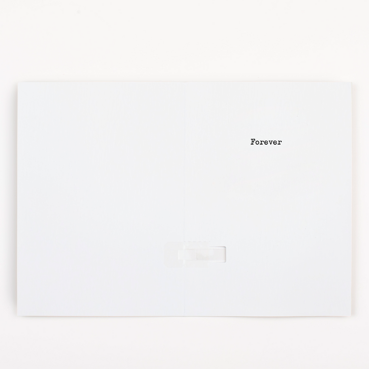Inside View – Open musical prank card showing the word “Forever” printed inside with activation tab visible.
