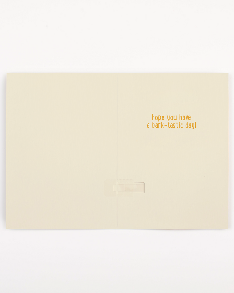Beige card with gold text 'hope you have a bark-tastic day!' on a white background
