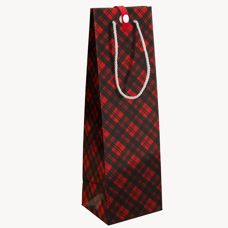 Side view of endless meowy Christmas musical bottle bag displaying tall bottle proportions with festive tartan plaid design