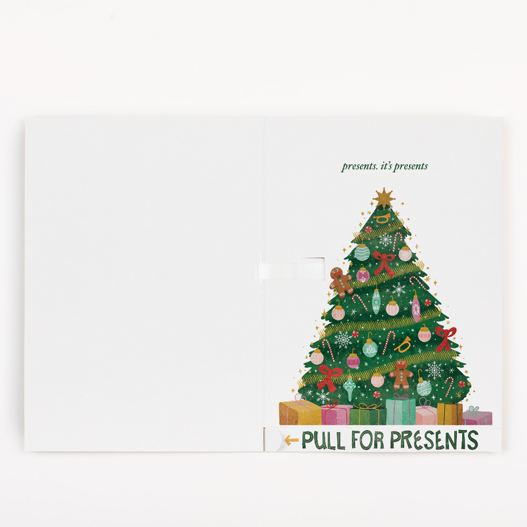 Christmas prank card final reveal with pull for presents tab and fully decorated tree showing endless musical activation system