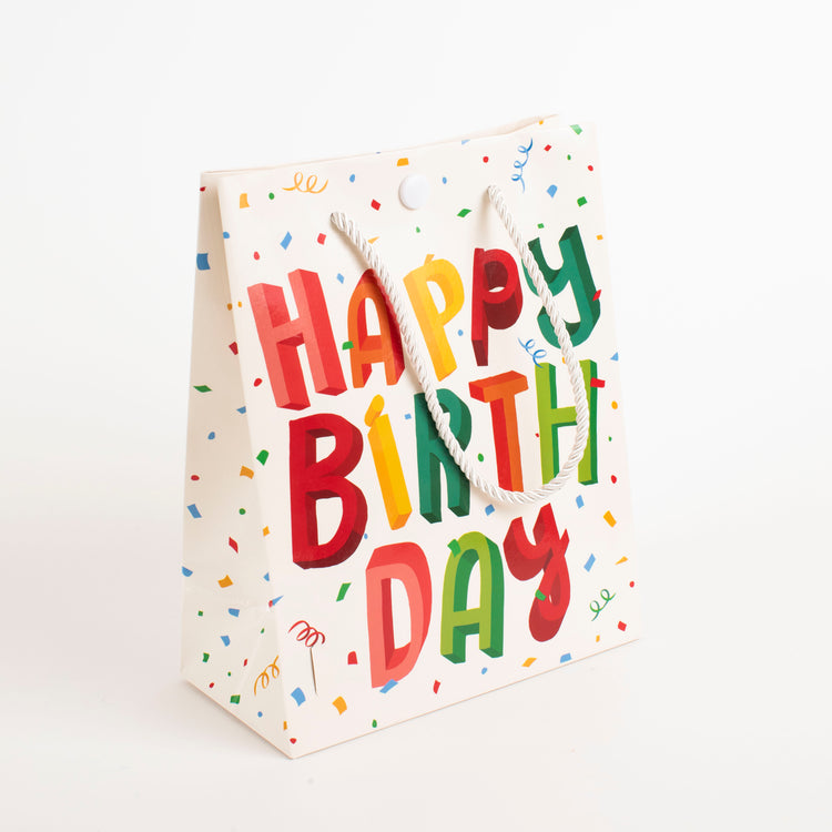 Side view of Happy Birthday endless farting musical gift bag showing vibrant lettering and festive confetti design