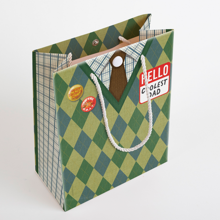 Musical Father's Day G.O.A.T gift bag side angle - argyle diamond pattern with rope handles and vintage dad badges"