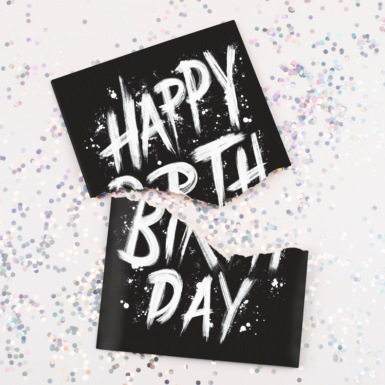 Torn Card with Glitter:
Happy Birthday Screamer musical card torn in half with multicolored glitter scattered around showing black paint splatter design and hidden glitter mess feature