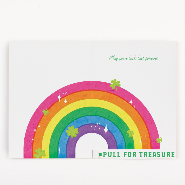 Opened card showing a colorful rainbow and text that says "Pull for Treasure"
