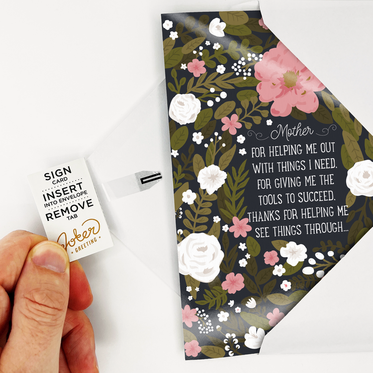 Hand pulling the tab out of the spine to activate it