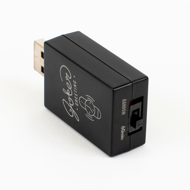 USB watch beep device showing Joker Greeting logo with timer icon and random 60min timing switch settings on bottom