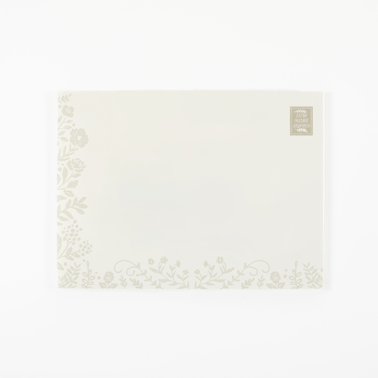 (Floral envelope closed): Floral glitter trap envelope by Joker Greeting with elegant flower design closed and ready for sophisticated prank setup
