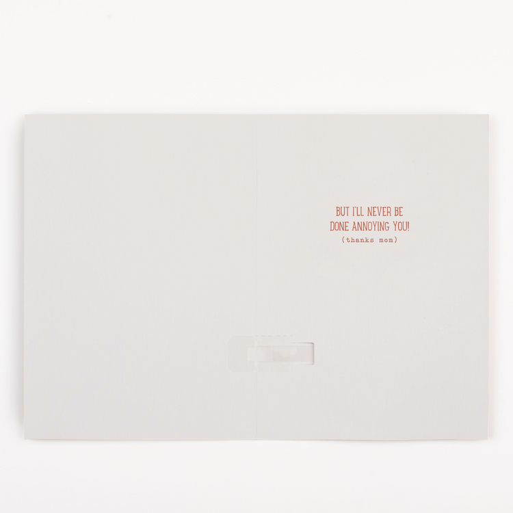 Interior of thank you card showing "But I'll Never Be Done Annoying You (thanks mom)" message in red text on cream background