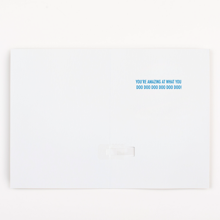 Inside view of endless Baby Shark musical greeting card showing You're Amazing at What You Doo Doo Doo message in blue text