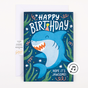 Complete Product with Instructions:
Baby Shark Happy Birthday endless musical prank card by Joker Greeting with white envelope showing Hope Its Jawsome message and musical note icon