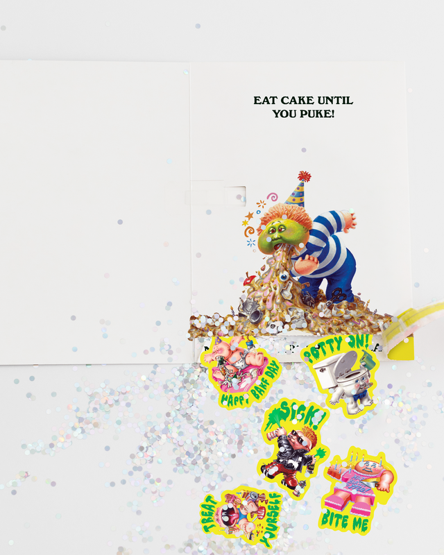 Colorful birthday cake with Garbage Pail Kids character and humorous text on a light gray background