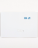 White greeting card with blue text '¡Salud!' on a white background