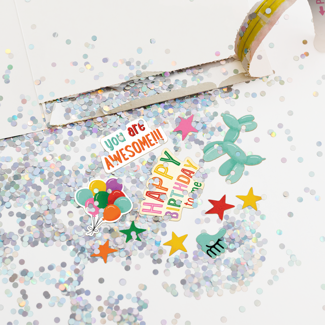 Pull Strip Glitter Explosion:
Piñata birthday card with pull strip activated showing massive glitter explosion and colorful birthday stickers scattered everywhere with You Are Awesome Happy Birthday message
