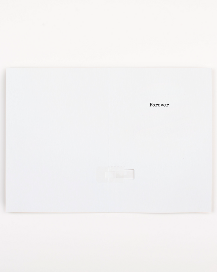 White card with 'Forever' text on a white background