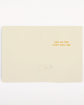 Beige card with gold text 'hope you have a bark-tastic day!' on a white background