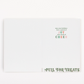 Holiday-themed card with text and a pull tab on a white background