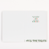 Holiday-themed card with text and a pull tab on a white background