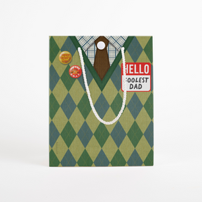Father's Day G.O.A.T musical gift bag front view - Hello Coolest Dad argyle pattern with Happy Father's Day and G.O.A.T badges