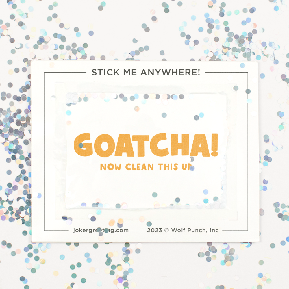 Backside of Joker Greeting goat prank device after removal with large glitter scattered around showing GOATCHA now clean this up secret message and stick me anywhere text