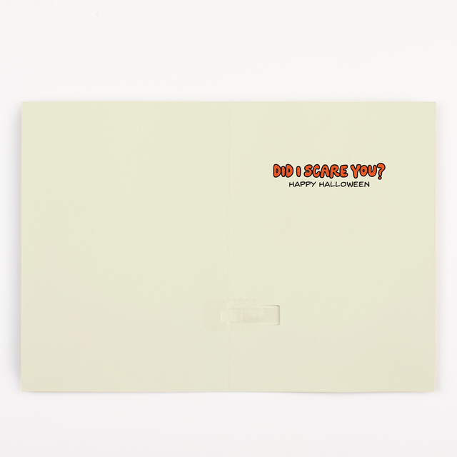 Halloween greeting card interior with Did I Scare You Happy Halloween message in orange text on cream background