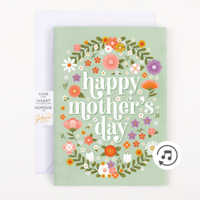 Joker Greeting Mother's Day card with envelope showing happy mothers day text in floral wreath design and musical note icon