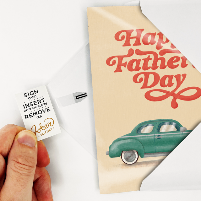 Joker Greeting musical Father's Day card with vintage green car - Rickroll prank greeting card plays Never Gonna Give You Up, classic car design - pulling tab out of card to show setup while card is in white plain envelope