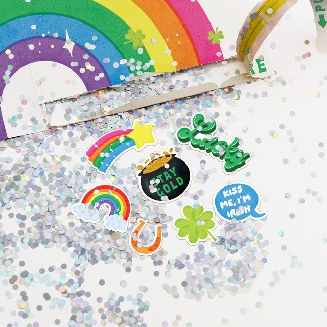 Closeup of the stickers and glitter being released from the card