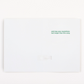 White card with green text on a white background