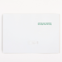 White card with green text on a white background