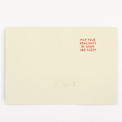  Inside of woofing Christmas card showing warm fuzzy holiday message before endless musical dog howling prank activates