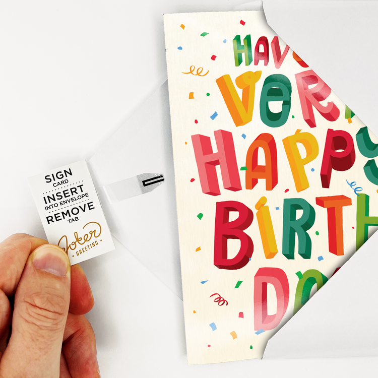 Birthday Fart Card inside the envelope pulling the tab out to prepare the card before sending